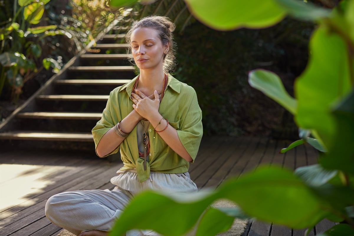 Peaceful woman in meditation expressing inner peace and mindfulness